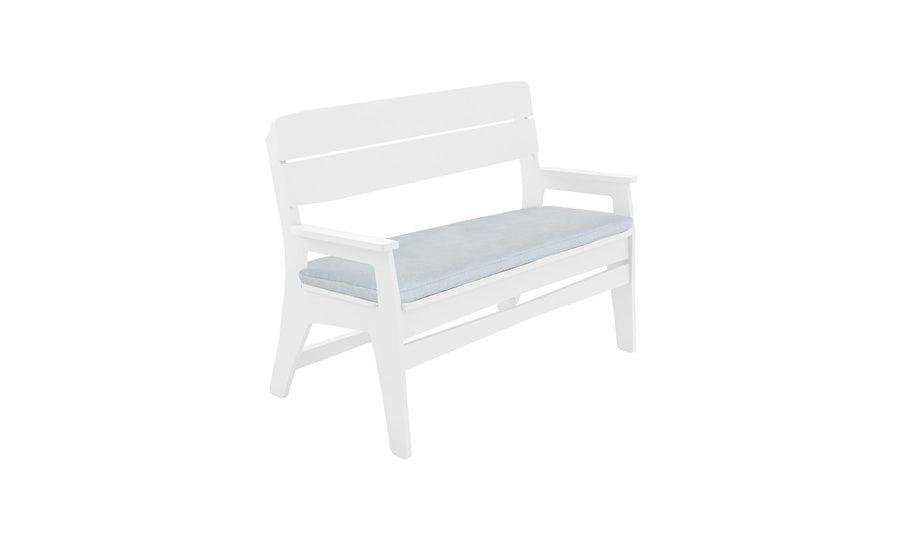 A wooden bench with armrests, featuring a Mainstay Bench Cushion by Ledge Lounger in light blue for a pop of color. The cushioned seat offers comfort and style against a plain white backdrop.