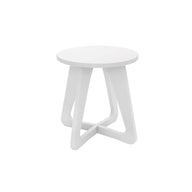 The Ledge Lounger Mainstay Stool features a minimalist white design with a round seat and three triangular legs against a plain backdrop. This sleek piece is perfect for patios, effortlessly enhancing any outdoor scene with its elegant style.