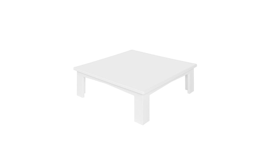 The Mainstay Sectional Endcap by Ledge Lounger is a minimalist, square white table with sturdy legs, providing extra table space against a plain white backdrop.