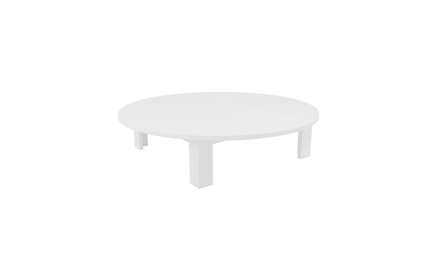 Enhance your outdoor space with the Mainstay Round Coffee Table by Ledge Lounger. Featuring a minimalistic design, this round white table boasts four short legs and sleek form, making it a standout piece against a plain backdrop to highlight its effortless style.