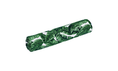 The Laze Doodle by Ledge Lounger is a cylindrical bolster pillow with a lush green leaf pattern on white, featuring overlapping large tropical leaves for a fresh, vibrant look.