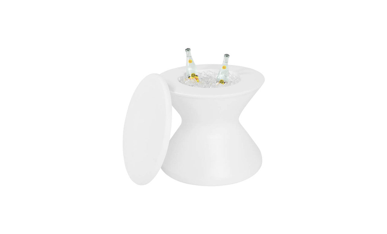 A white, UV-resistant, hourglass-shaped cooler featuring Ledge Loungers Signature Side Table Lid reveals ice and two bottles inside when set aside. Its minimalist design emphasizes functionality, making it perfect for any modern outdoor scene.