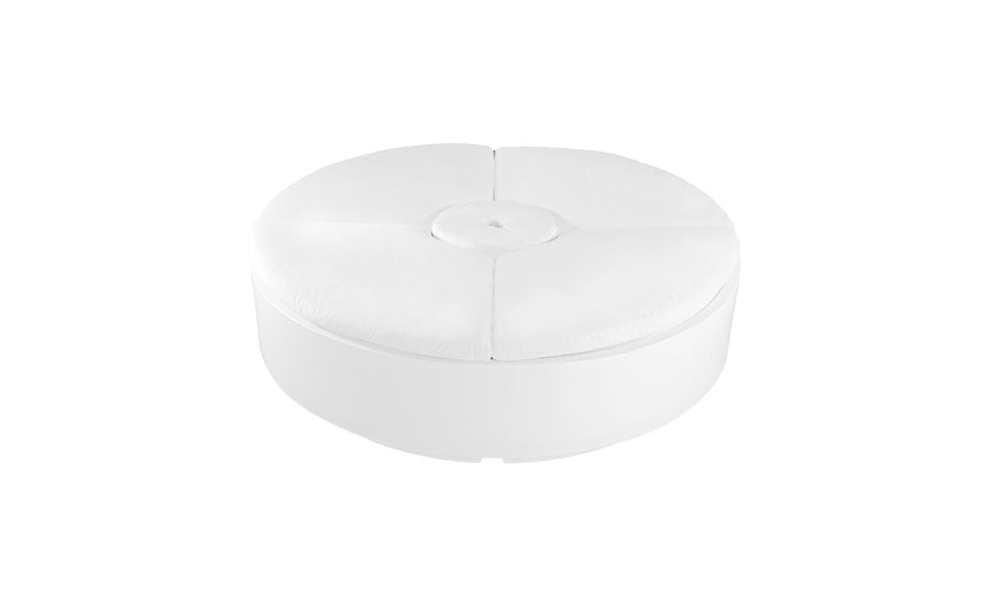 A round, white upholstered ottoman with a button-tufted center detail, reminiscent of Ledge Loungers Signature Round Sunbed, is displayed on a plain white background.