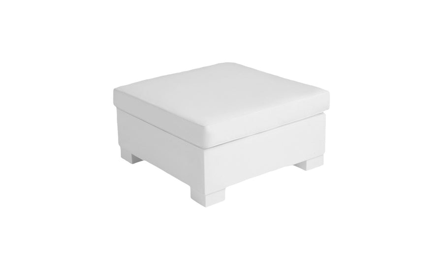 A white, square Signature Sectional Ottoman by Ledge Lounger features a cushioned top and sturdy legs, displayed against a plain white background.