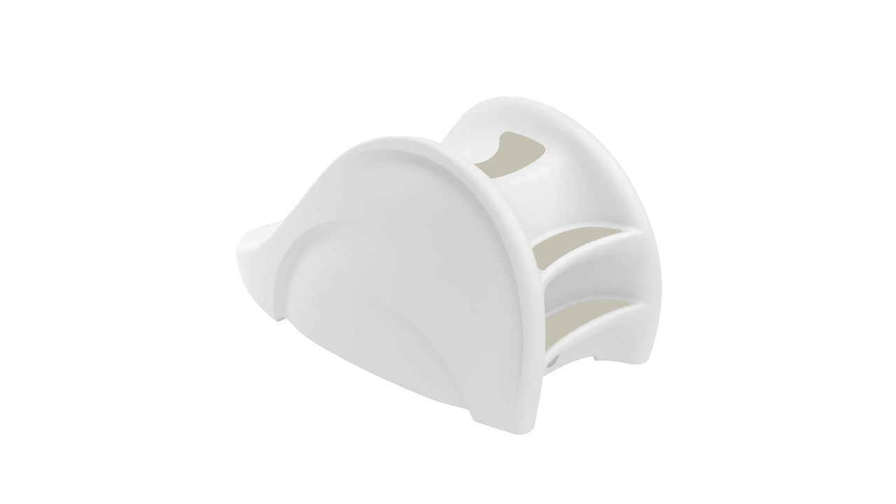 The Ledge Lounger Signature Slide is a chic and functional poolside accessory with a modern, white curved design featuring three arched slots for napkins. It enhances any table setting with elegance against a plain white background.