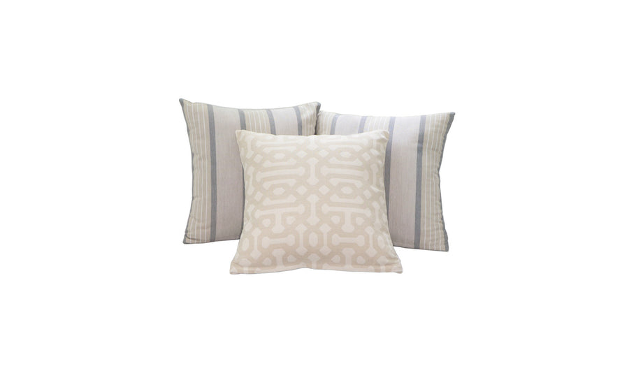 An elegant arrangement of three Ledge Lounger Throw Pillows is displayed against a white background. The front pillow boasts a cream geometric pattern, while the two behind feature light blue and white vertical stripes. All are 18 square and part of a final sale.
