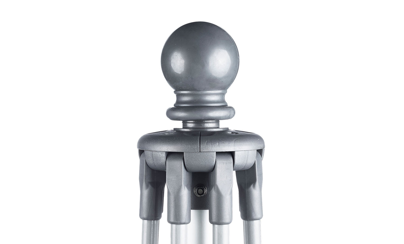 Close-up of the grey metallic Ledge Lounger Essential Fiberglass Umbrella - 10 Square Pulley, featuring a round top and interlocking parts. The industrial design offers a sturdy, mechanical look against a white background.