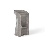 The Signature Barstool Bar Height by Ledge Lounger is a modern, minimalist gray stool with a curved backrest and sculptural arching base. Its weatherproof, with smooth edges and a textured surface, ideal for outdoor entertaining or as a chic addition to any pool bar setting.