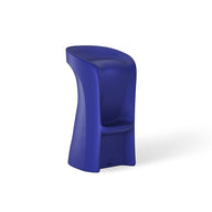 Introducing Ledge Loungers Signature Barstool Bar Height: a modern, sculptural piece in vibrant blue. Its smooth curved seat with back support and footrest enhances comfort, ideal for poolside seating. Crafted from a single material, it elevates outdoor entertaining against a plain white backdrop.