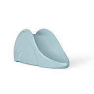 The Ledge Lounger Signature Slide is a childrens light blue slide with smooth, rounded edges and a compact design, perfect for sunny days by the tanning ledge. Set against a plain white background, its an inviting addition to any outdoor play area.