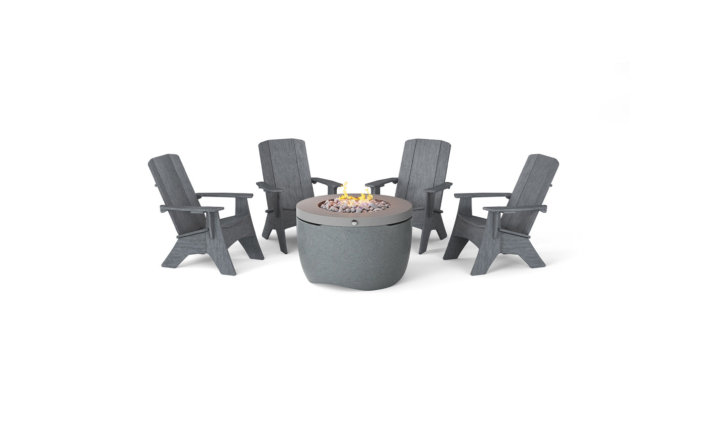 The Ledge Lounger Halo Aglow Bundle features a round outdoor fire pit table with a stone bowl and two candles, surrounded by four dark gray Adirondack chairs on a white background.
