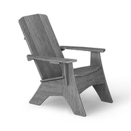 The Mainstay Ultimate Adirondack by Ledge Lounger is a wooden chair ideal for poolside relaxation, featuring a high backrest and wide armrests. Its simple rustic design and slightly reclined seat are perfect for outdoor lounging, beautifully displayed at an angle on a white background.