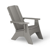 Side view of the Mainstay Ultimate Adirondack by Ledge Lounger, a gray outdoor lounge chair with wide armrests and a slatted back, featuring a slightly reclined backrest and sturdy minimalist design on a white background.
