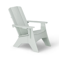 The Mainstay Ultimate Adirondack by Ledge Lounger, in light green with wide armrests and a slanted backrest, is sturdy and classic. Ideal for poolside relaxation, it comes against a white background.