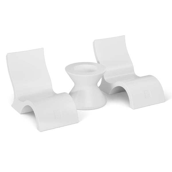 A Relaxation In-Pool Chair & Ice Bin Bundle by Ledge Lounger, featuring two modern white lowback chairs, is arranged around a white cylindrical side table for an ergonomic and minimalist seating setup.