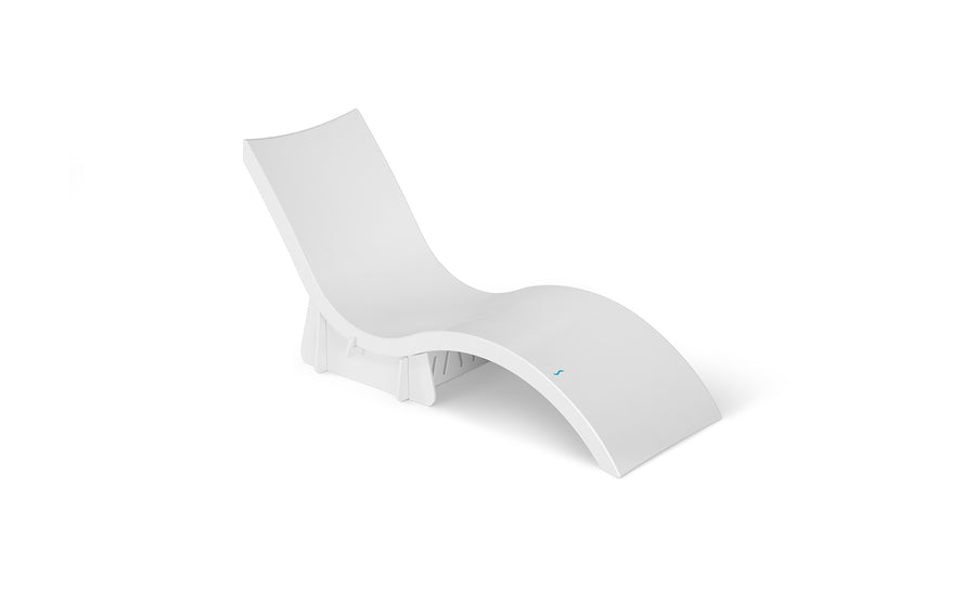 The Signature Chaise Riser by Ledge Lounger is a modern, sleek white lounge chair with a minimalist design, featuring a curved seat and backrest. Ideal as one of the in-pool seats or for enhancing any setting with its elegant presence against a plain white background. Perfect for outdoor days.