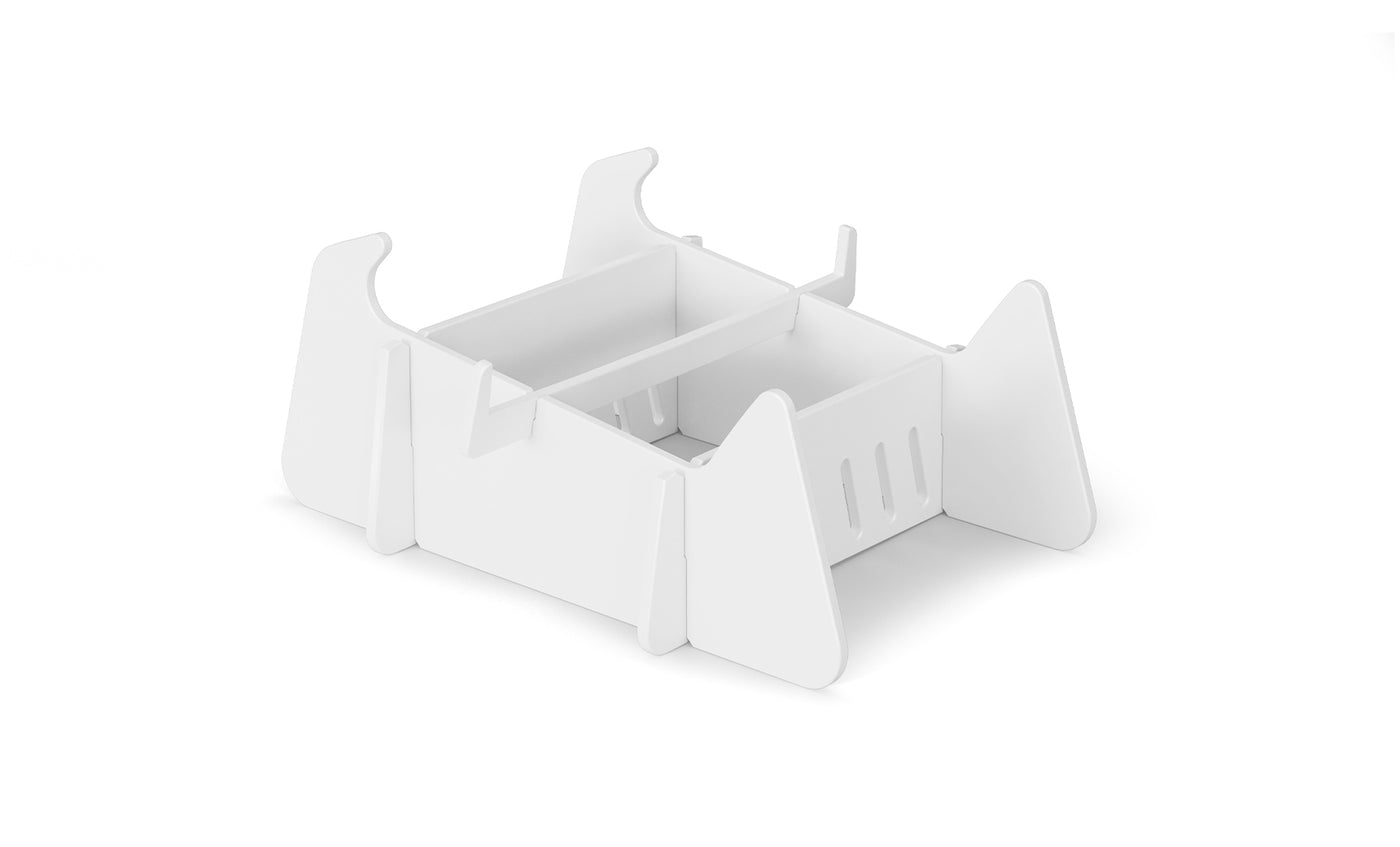 A white, rectangular, flat-pack cardboard box with slots, flaps, and interlocking tabs—ideal for organizing Ledge Lounger Signature Chaise Deep Riser—instands on four trapezoidal panels against a plain white background.