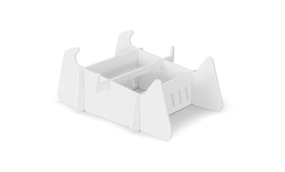A white, rectangular, flat-pack cardboard box with slots, flaps, and interlocking tabs—ideal for organizing Ledge Lounger Signature Chaise Deep Riser—instands on four trapezoidal panels against a plain white background.