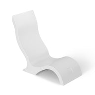 The Signature Chair by Ledge Lounger is a modern, white S-shaped lounge chair with a minimalist design featuring smooth curves and no visible legs, ideal for enhancing your tanning ledge or outdoor oasis. Its sleek form beautifully complements any serene setting.