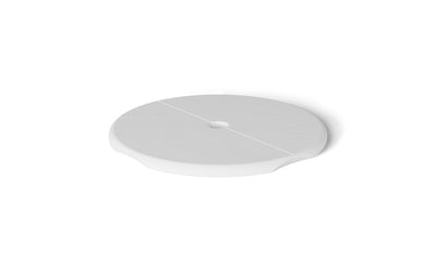 The Ledge Loungers Signature Side Table Lid with Umbrella Hole is a white, round, flat object featuring a subtle groove across its diameter. Resting against a plain white background, its an essential poolside necessity for any outdoor scene.
