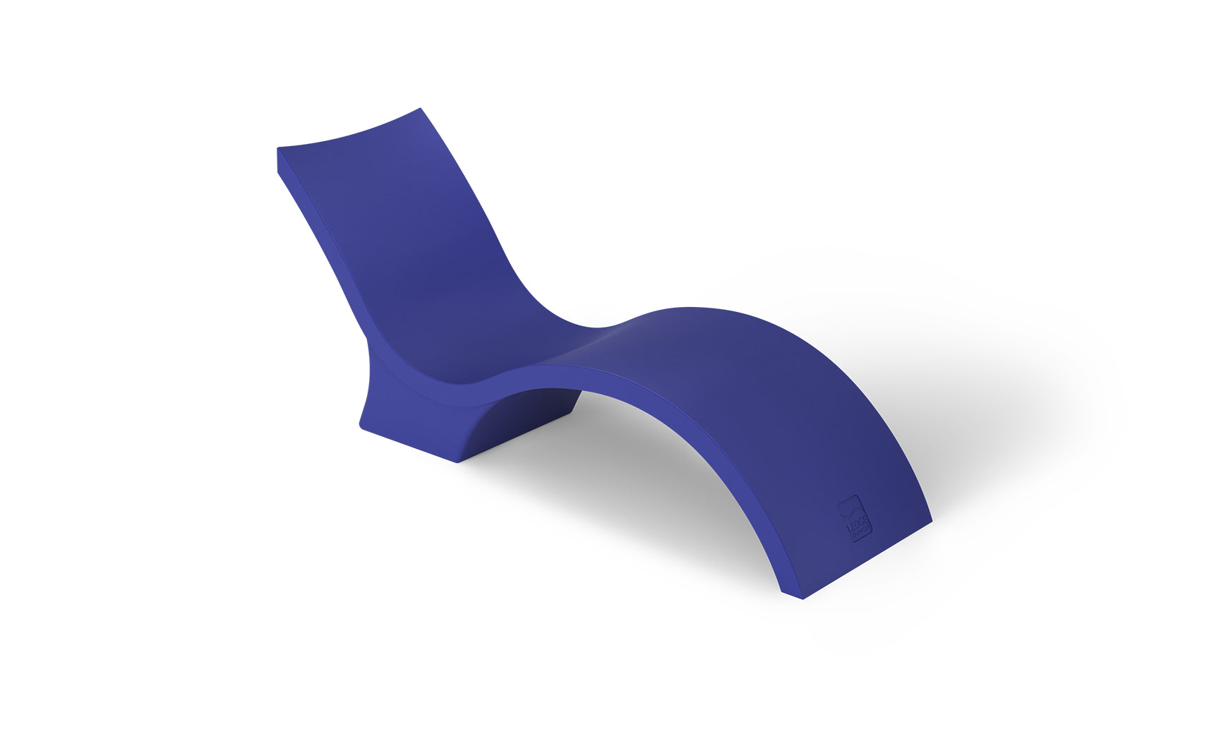 The Signature Chaise Deep by Ledge Lounger is a sleek, modern lounge chair with a minimalist wave design in bold blue. Its smooth, curved form creates a contemporary look, perfect for relaxing on the tanning ledge or adding flair against a plain white background.