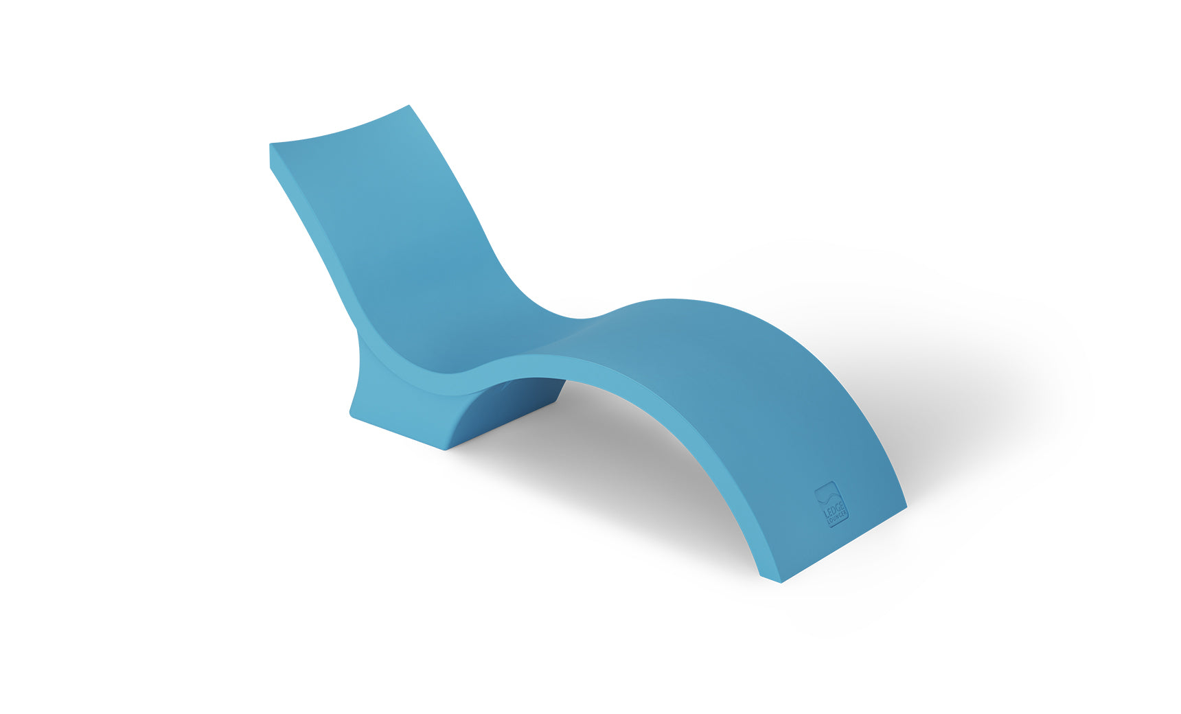 The modern Signature Chaise Deep by Ledge Lounger boasts a sleek, curved design in blue with an undulating shape like a sun shelf on a tanning ledge, all set against a plain white background.