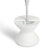 The Signature Tall Ice Bin Side Table by Ledge Lounger has a sleek, modern white design resembling an umbrella base. Its minimalist look features a smooth finish, while its hourglass shape adds elegance against a plain white background.