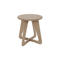 The Ledge Lounger Mainstay Stool features a wooden round top and three interlocking curved legs in a light wood finish. This minimalist, modern design is perfect for patios, offering versatile elegance to any outdoor setting.
