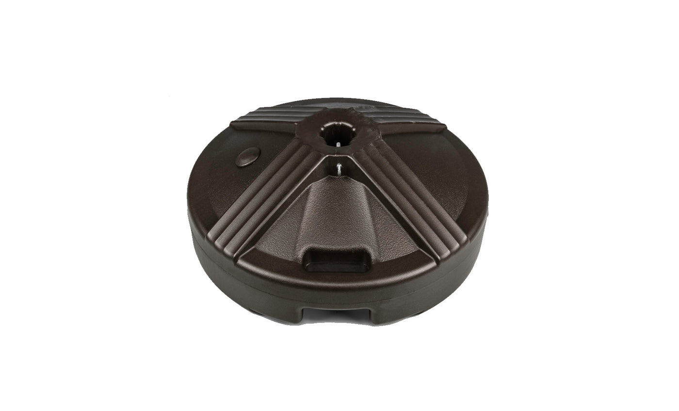 The Ledge Lounger Resin Coated Concrete Umbrella Base boasts a black, circular, textured surface and is perfect for center pole umbrellas. It secures the umbrella with a central hole, enhancing any outdoor dining setup.