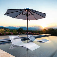 Ledge Lounger in-pool umbrella and chaises.