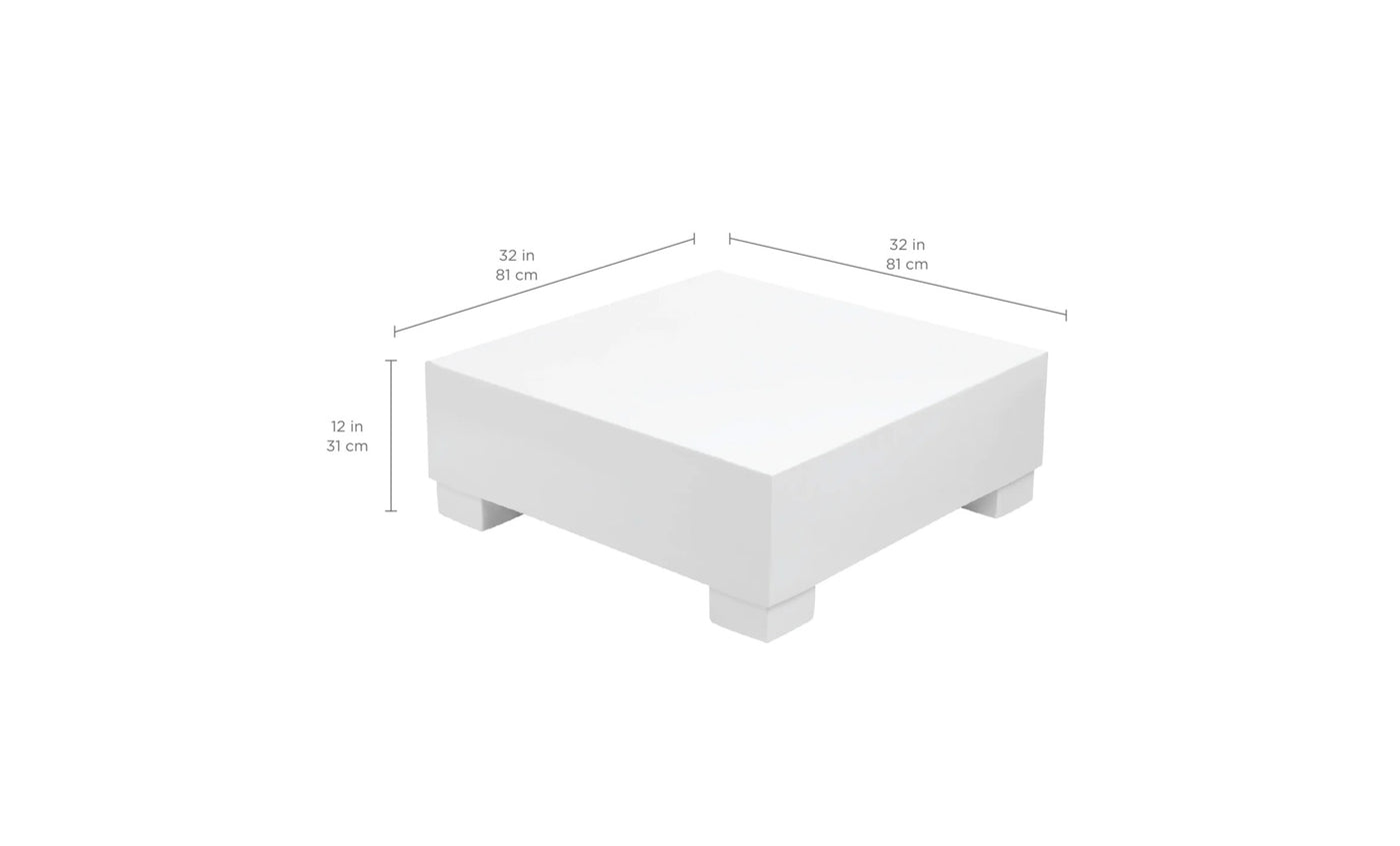 Meet the Signature Coffee Table by Ledge Lounger: a white, minimalist square table on short legs, measuring 32 x 32 x 12. Perfectly crafted for chic aesthetics, its an ideal addition to your poolside essentials.