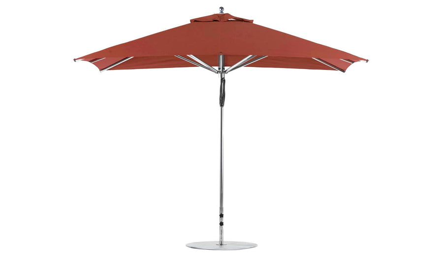 Introducing the Ledge Lounger Premier Aluminum Umbrella - 8.5 Rectangle Pulley: a red patio umbrella with wind-resistant, marine-grade fabrics, a shiny silver pole, and round metallic base. Its modern design includes a vented top for enhanced durability and style.