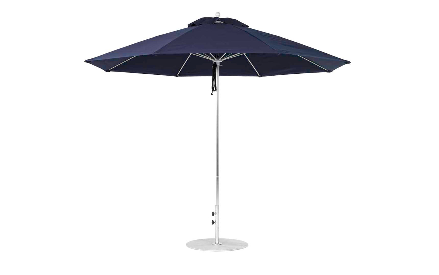 The Ledge Lounger Essential Fiberglass Umbrella, featuring an 11 octagon canopy made from marine-grade fabrics in navy blue, is supported by a sturdy white metal pole. This wind-resistant patio umbrella stands upright with a circular base for ground stability.