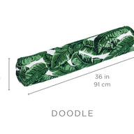 The Laze Doodle by Ledge Lounger is a cylindrical bolster cushion with a green leafy pattern, featuring dimensions of 8 inches (20 cm) in diameter and 36 inches (91 cm) in length.