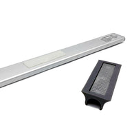 The Umbrella Light by Ledge Lounger includes a sleek silver bar with textured detail, paired with a rechargeable black rectangular attachment featuring a grid pattern. It fits seamlessly onto the bar to enhance your patio, all set against a plain white background.
