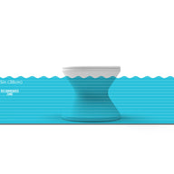 The image shows a blue wave-like chart with water levels and a marker indicating a drift zone starting at 15 inches (38 cm). In the background, there is a white Signature Tall Ice Bin Side Table by Ledge Lounger, resembling an hourglass-shaped umbrella base, partially submerged.