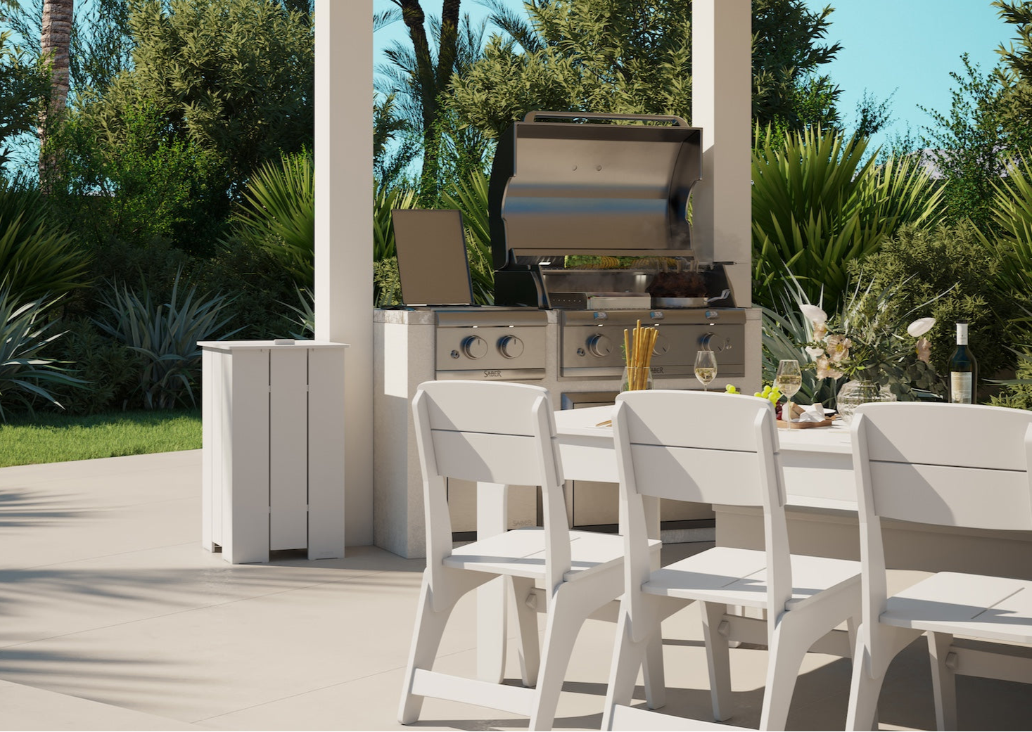 Outdoor setting with a grill, table, and chairs on a patio