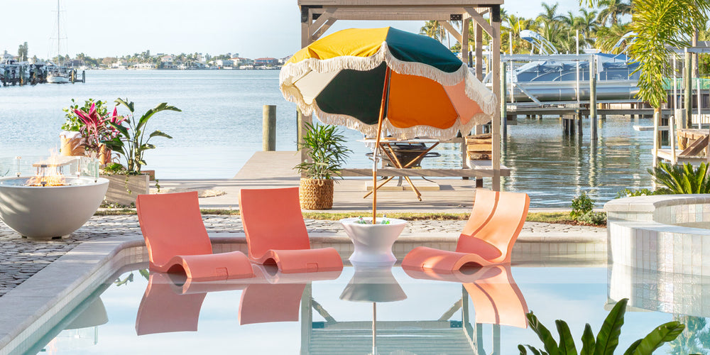 Stylish outdoor scene with pool furniture on the ledge