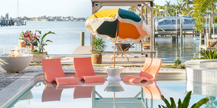 Stylish outdoor scene with pool furniture on the ledge