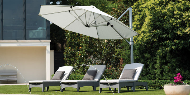 Umbrella over outdoor chaises