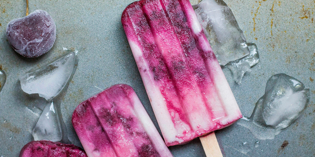 pink or purple fruit popsicles 