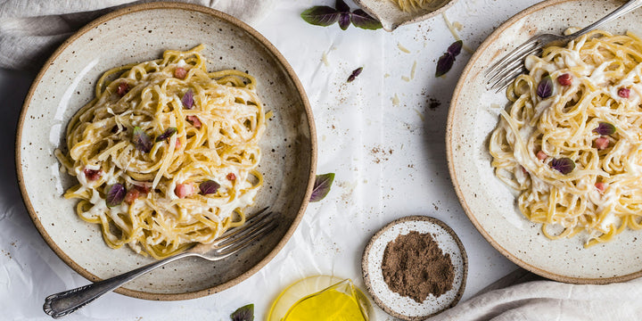 Plates of pasta carbonara 