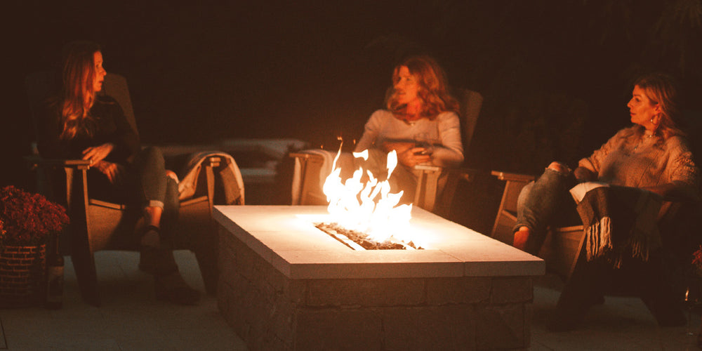 Friends around the outdoor fire pit