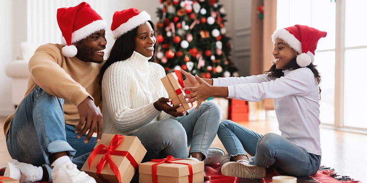 Families exchanging gifts for Christmas