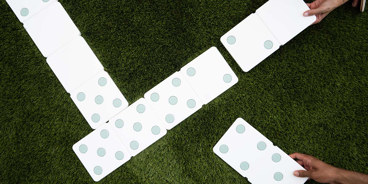 How to Play Dominoes In Your Backyard for Fun All Afternoon