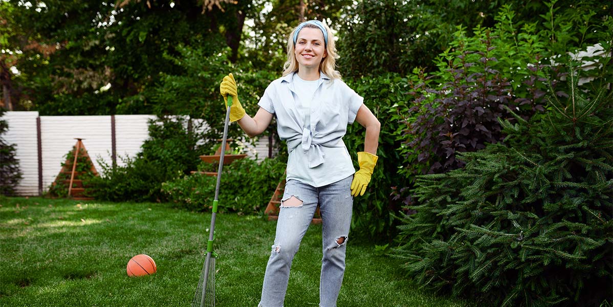 Woman ready for spring cleaning outside