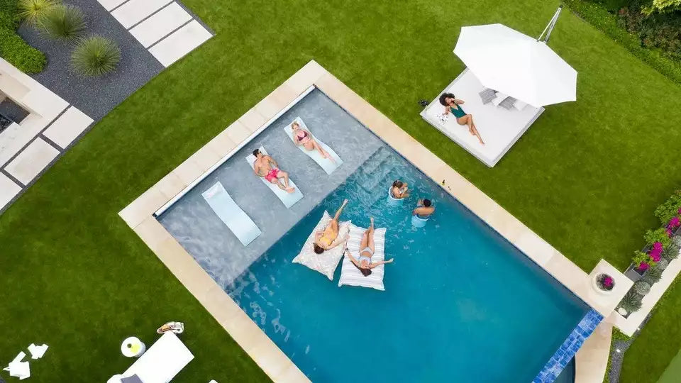 People enjoying a pool party with Ledge products