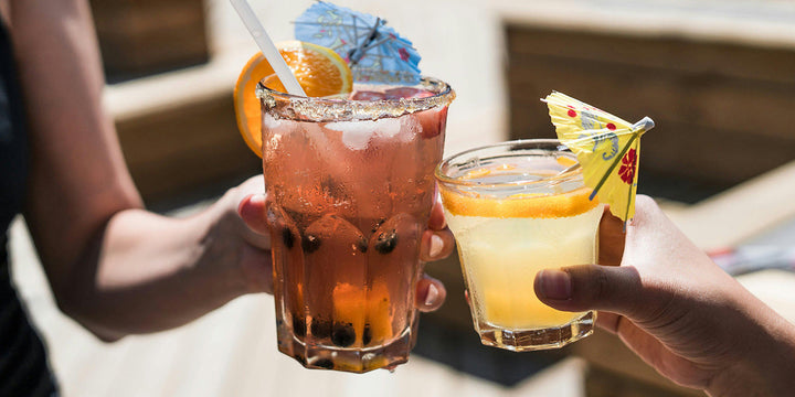 Clinking glasses with mocktails 