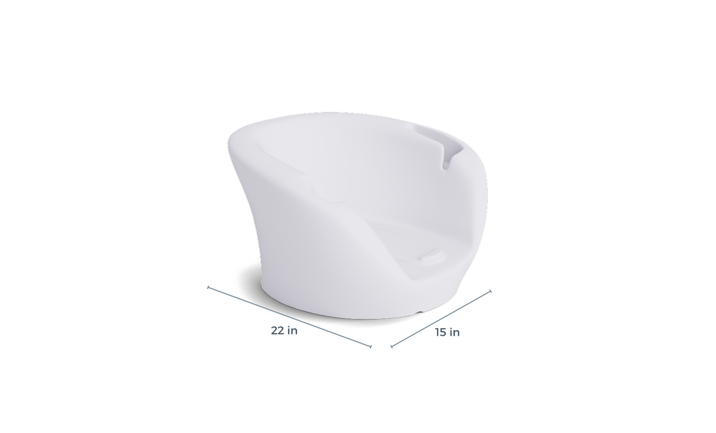 The Ledge Lounger Autograph Chaise Armrest Console features a modern, white, rounded design with a smooth surface. Dimensions: 22" wide x 15" deep.