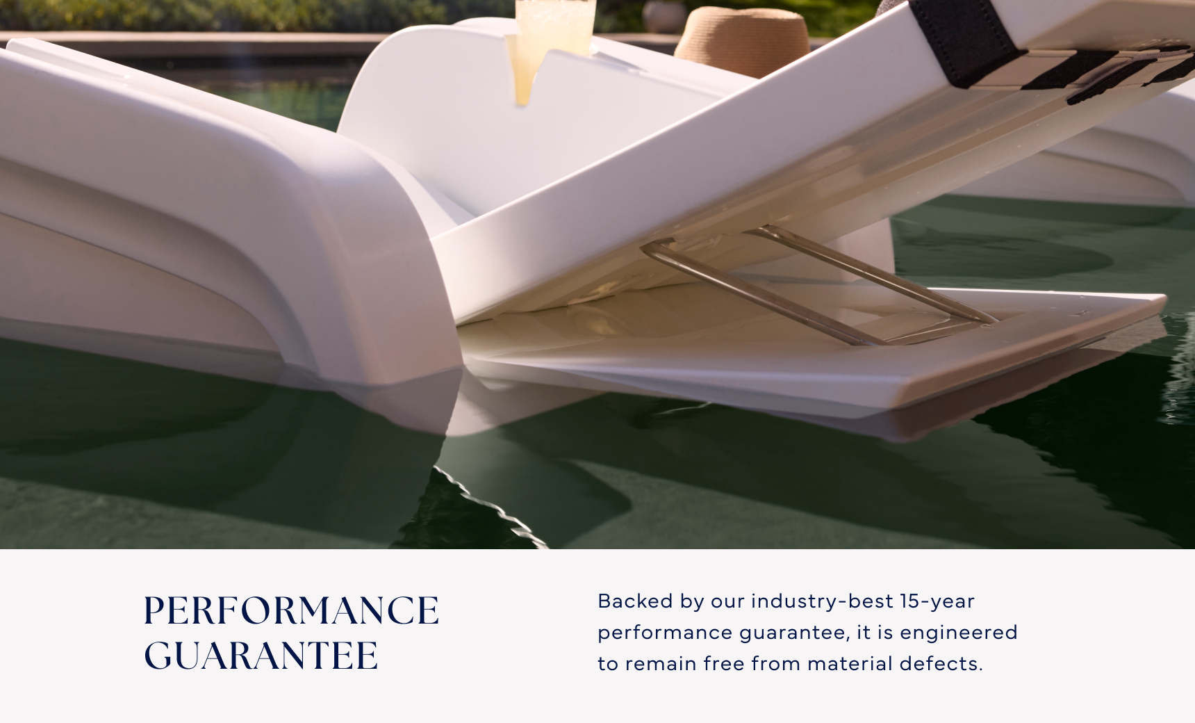 Close-up of the Ledge Lounger Signature Chaise Armrest Console, a modern white poolside lounge chair partially submerged on a sun shelf, with text below the image noting its 15-year performance guarantee for material defects.